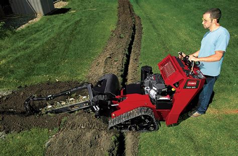 trencher on stand behind skid steer|bobcat walk behind trencher.